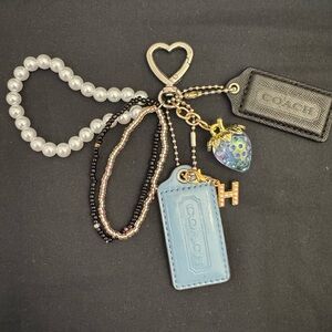 Coach Blue and Black hang tag keychain with blue strawberry and Pearl Accents